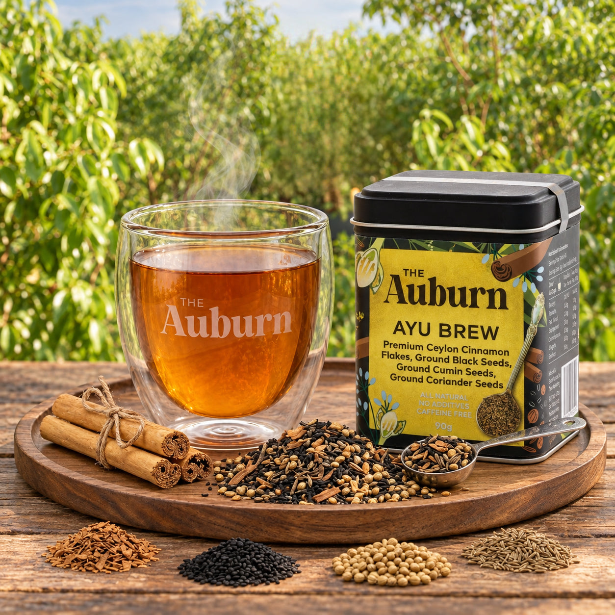 Ayu Brew tin with a glass cup