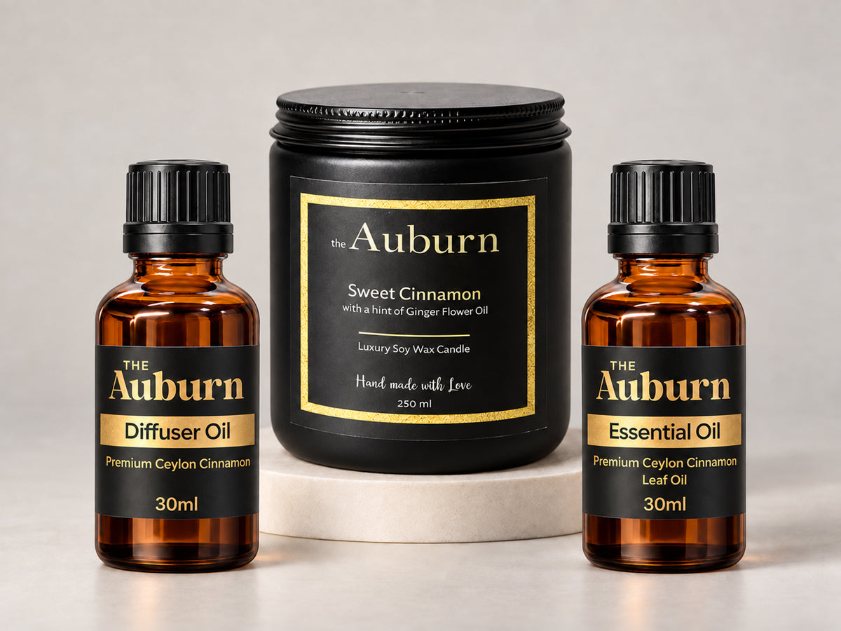 The Auburn Sweet Cinnamon soy wax candle beside the 30ml Diffuser Oil and 30ml Cinnamon Leaf Essential Oil